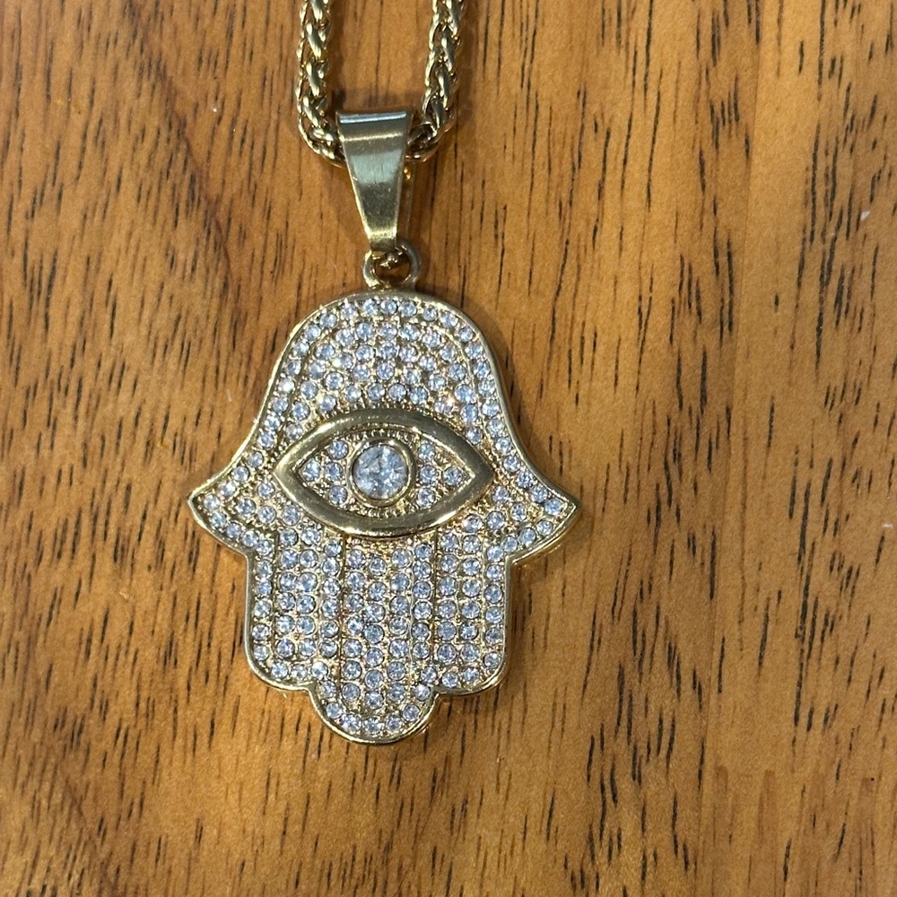 Gold Hamsa Pendant Necklace with Diamond in center of Evil Eye.